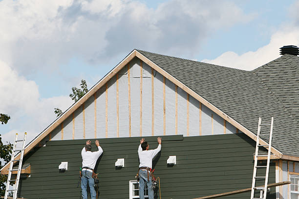 Professional Siding technician working in Ayden, NC